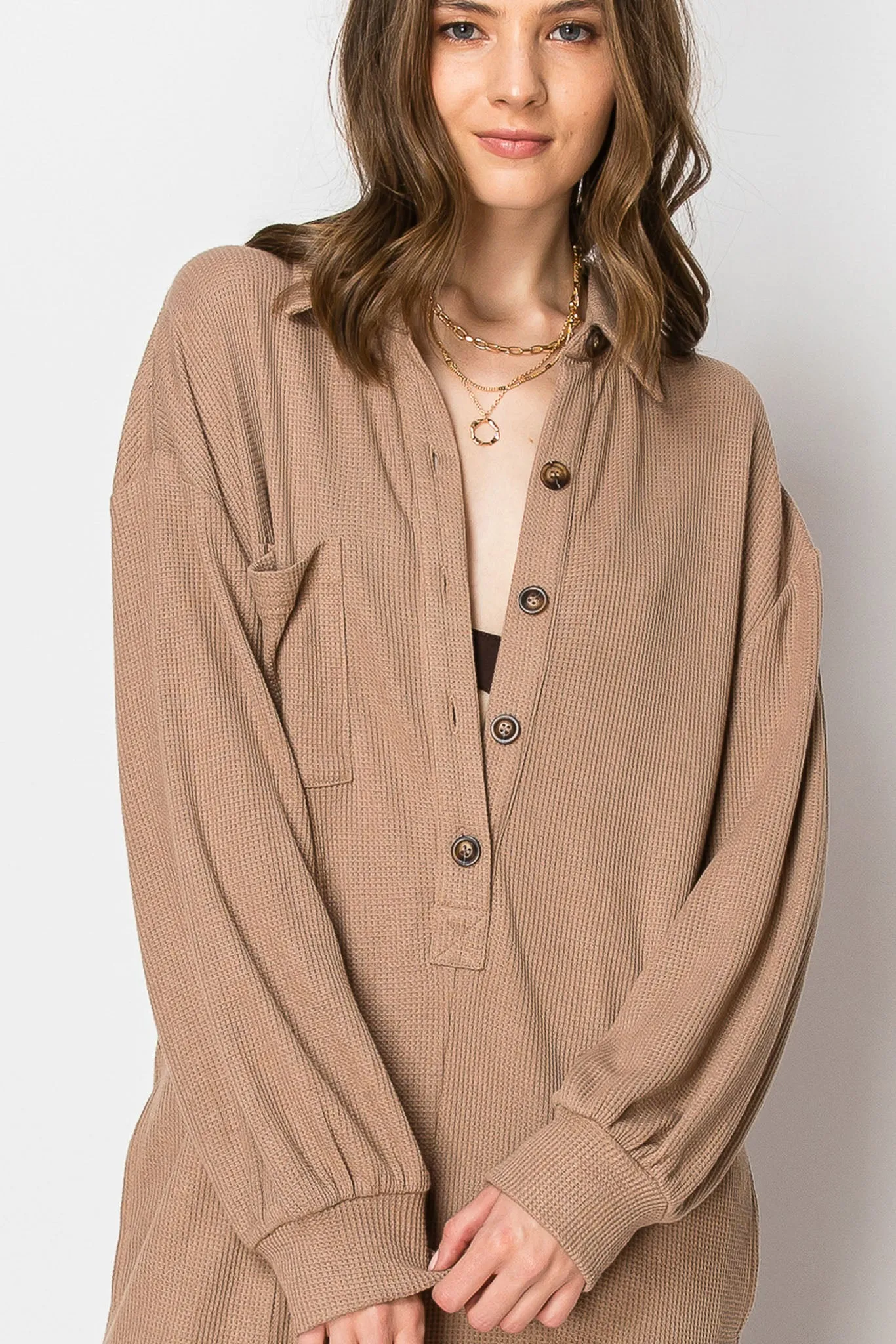 LONG SLEEVE WAFFLE KNIT BUTTON DOWN ONESIE WITH POCKETS