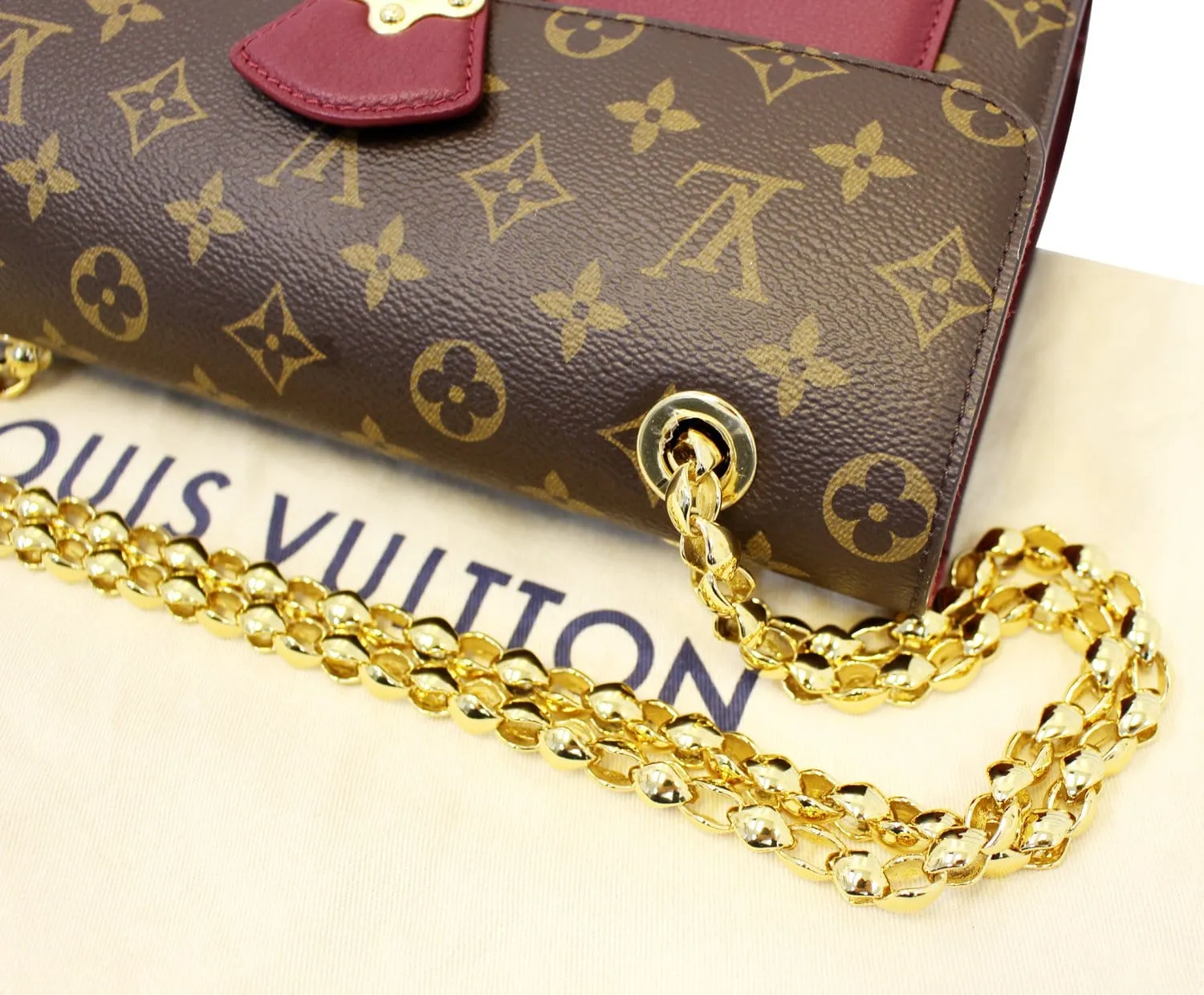 LOUIS VUITTON Monogram Canvas Raisin Victoire Shoulder Bag
