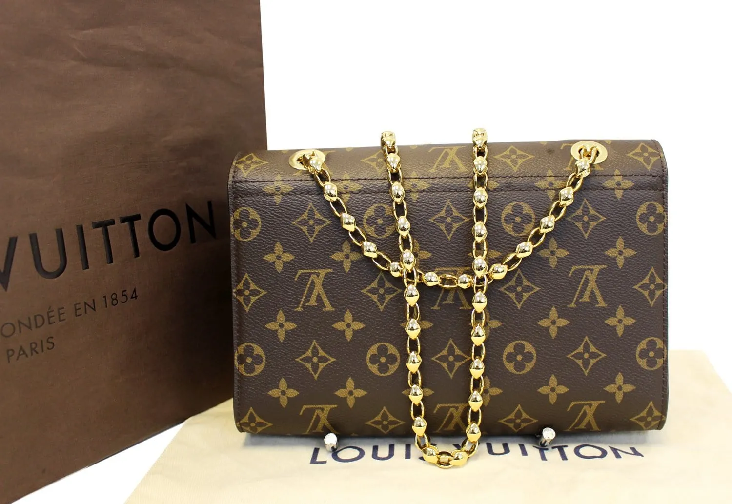 LOUIS VUITTON Monogram Canvas Raisin Victoire Shoulder Bag