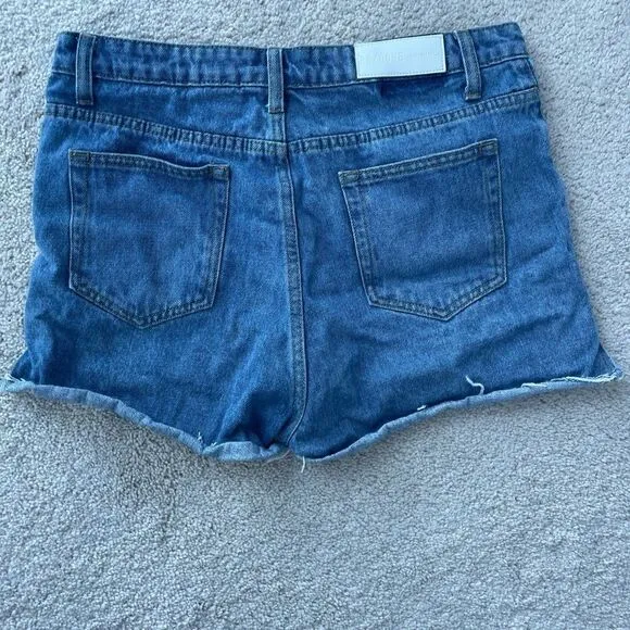 𝅺re/done recycled distressed high rise shorts Sz 29