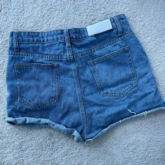 𝅺re/done recycled distressed high rise shorts Sz 29