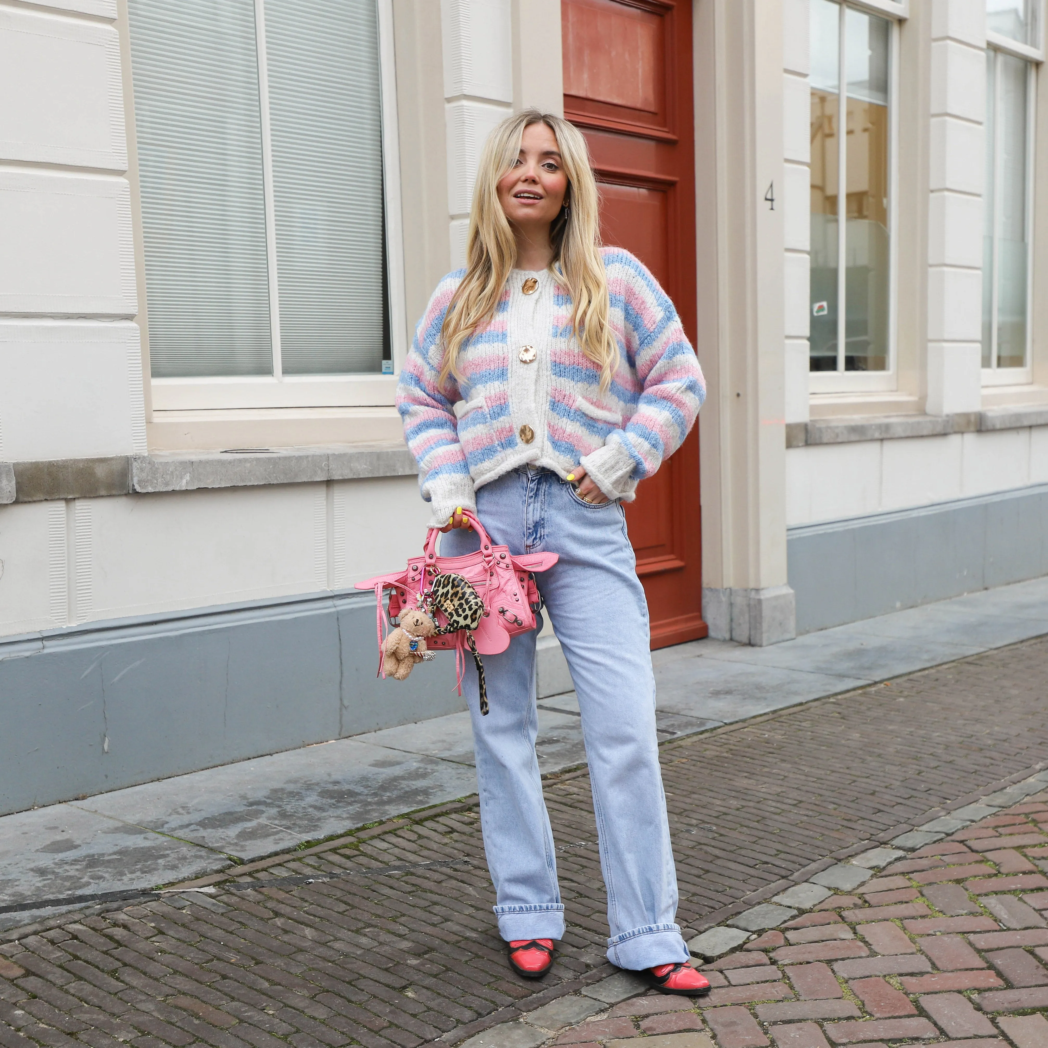 Streep vest gouden knoop roze blauw