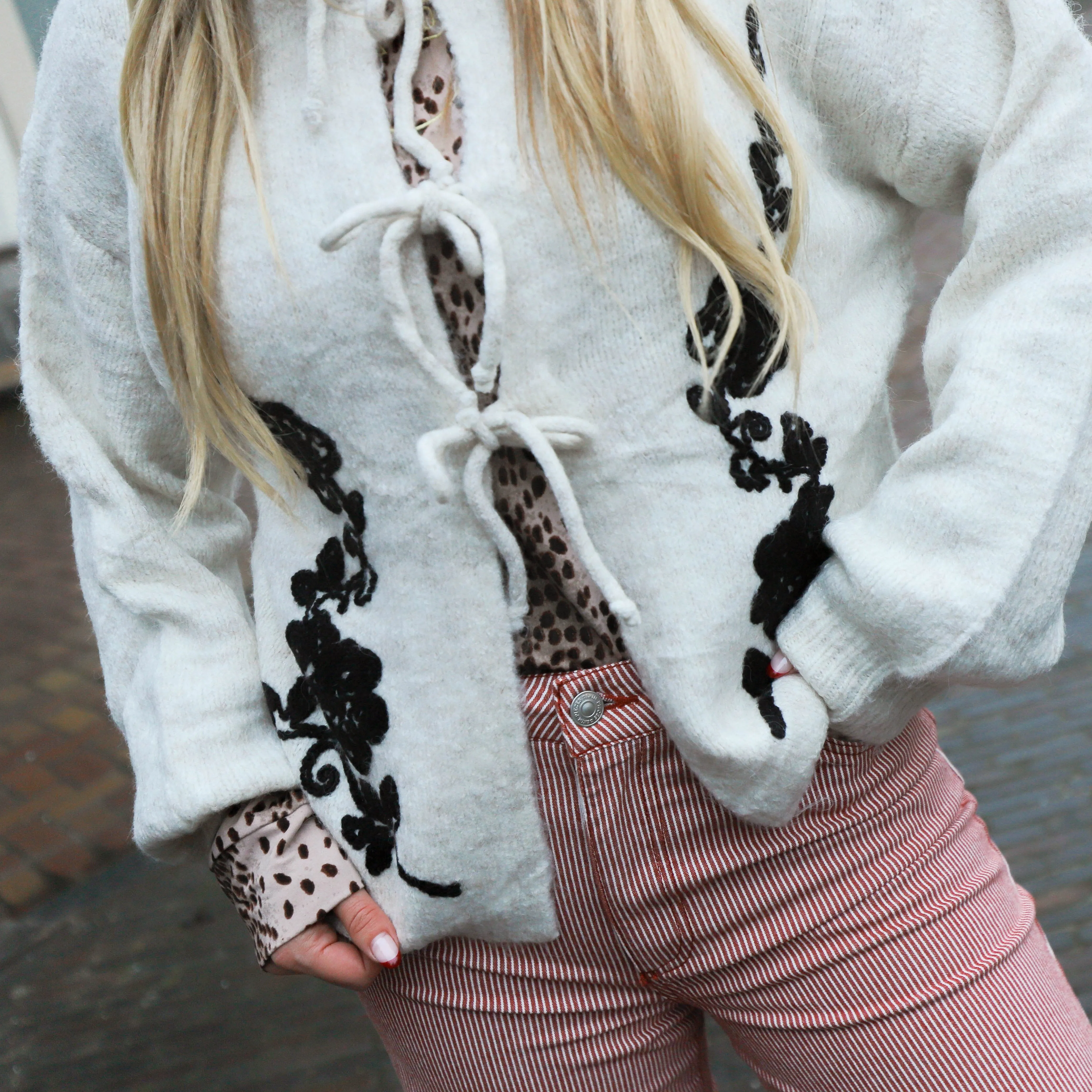 Vest roses strikjes